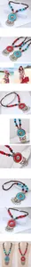 Close-up of bohemian pendant necklace with turquoise beads and metallic tassels