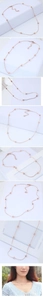 Detail of rose gold beaded snake chain necklace with lobster clasp and mirror finish