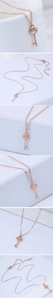 Close-up of rose gold heart key necklace with adjustable lobster clasp chain details