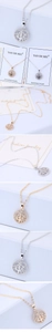 Detail of tree of life pendant with sparkling cubic zirconia on gold and silver necklaces