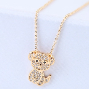 Golden necklace with a cute puppy pendant featuring clear zircons and a polished finish
