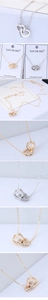 Macro shot of interlocking double hearts necklace featuring zircon stones and real gold plating