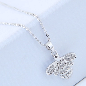 Exquisite bee pendant necklace with sparkling cubic zirconia on a silver cross chain
