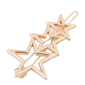 Pince à cheveux en métal doré minimaliste avec trois étoiles évidées superposées