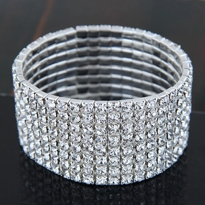 Sparkling 8-row zircon rhinestone elastic bracelet with silver finish on reflective background