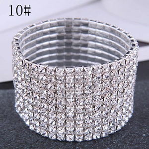Macro detail of multi-row sparkling crystal rhinestone silver cuff bracelet for women