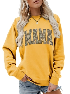 Detail of yellow sweatshirt featuring camouflage MAMA text print and ribbed crew neck