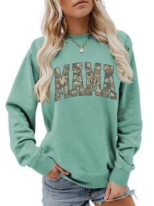 Detail of MAMA lettering with camouflage print on mint green long sleeve sweatshirt