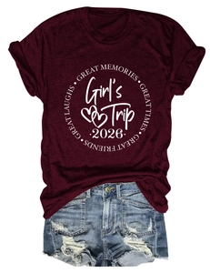 Detail of burgundy t-shirt with Girl's Trip 2026 print and distressed denim shorts