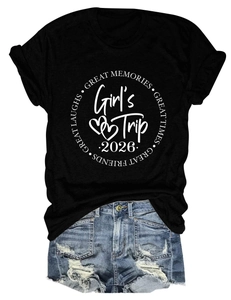 Detail of Girl's Trip 2026 white circular print on black cotton crew neck short sleeve tee
