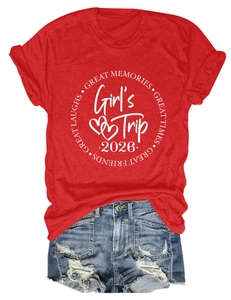 Detail view of a red cotton T-shirt with Girl’s Trip 2026 print and distressed denim shorts