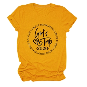 Close-up of yellow cotton t-shirt featuring Girl's Trip 2026 circular graphic print