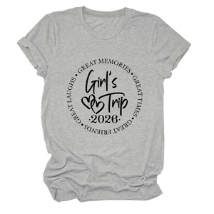 Detail of Girl's Trip 2026 print on soft light grey cotton t-shirt with heart graphics