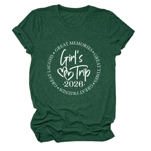 Detail of dark green cotton T-shirt featuring a white circular Girl's Trip 2026 graphic print