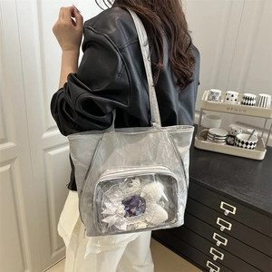 Silver pleated oversized tote bag with transparent display pocket for enamel pins