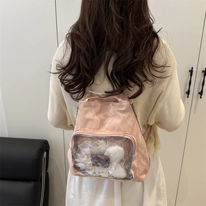 Pink nylon mini backpack with transparent window display and cute anime pins for women