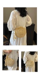 Detail of round straw crossbody bag with spiral weave and bohemian tassel accents
