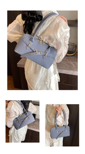 Three-way view of blue woven PU pillow bag with gold buckles and dual top zippers