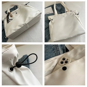 Detailed views of white tote bag featuring adjustable side drawstrings and magnetic closure