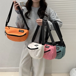 Fashionable solid canvas half-moon crossbody bag in various colors for casual daily wear