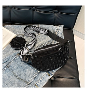 Detail of black rhinestone waist bag with geometric strap and mini round coin purse