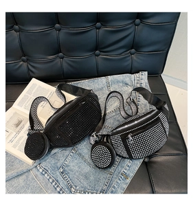 Detail of rhinestone fanny pack with wide jacquard strap and mini pouch on leather bench