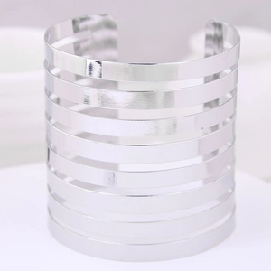 Chic silver hollow leaf-style open cuff bracelet with minimalist metallic finish