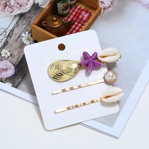Süßes 3er-Set Haarklammern mit Perlen und Muscheln in Gold und Violett Optik