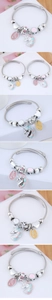 Detailed views of unicorn charm bracelets with colorful enamel beads and wire mesh bands
