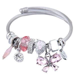 Chic silver butterfly bangle with pink crystal charms and beads on twisted steel wire