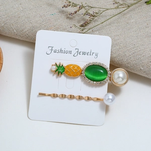 Strawberry and pineapple hair clip set with artificial pearls and green gemstones