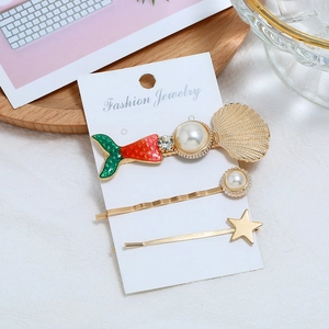 Lot de barrettes marines avec motifs d'étoile de mer et perles sur présentoir