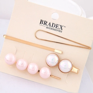 Elegante 4-delige gouden haarspeldenset met roze en iriserende witte parels op kaart