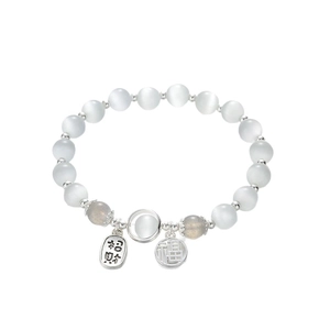 Cat's eye stone beaded bracelet with lucky silver charms and gray crystal accents