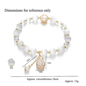 Elegant beaded bracelet featuring tulip pendant, cat eye stones and freshwater pearls