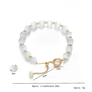 Cat eye stone and freshwater pearl bracelet with golden adjustable slider chain