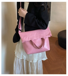 Pink PU leather crossbody bag featuring large capacity and soft texture for daily use