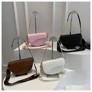 Collection of leather saddle bags in four colors with chain and wide shoulder straps