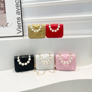 Mini heart-embossed crossbody bag with pearl handle and metal chain in five colors