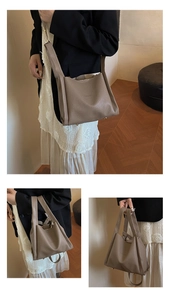 Detailed views of khaki pebbled leather bucket bag with top handles and adjustable strap