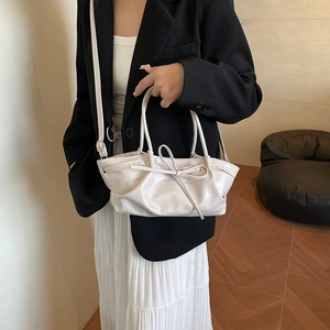 Minimalist white bow tote bag with pleated design and detachable strap for women