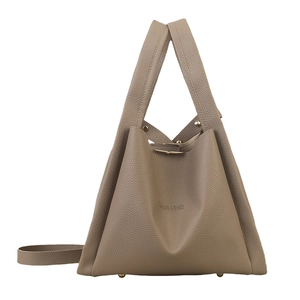 Brown lychee leather bucket tote bag with top handles and adjustable shoulder strap