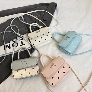 Mini sac à bandoulière chic à pois avec nœud en métal en quatre couleurs de mode