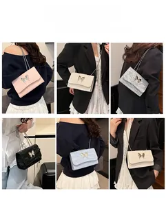 Detail view of the butterfly crossbody bag showing multiple styling and wearing options