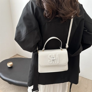 White lychee leather small square handbag with SM logo and shoulder strap for women