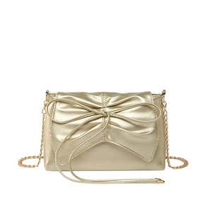 Sac bandoulière rectangle or champagne avec grand nœud et chaîne en métal doré