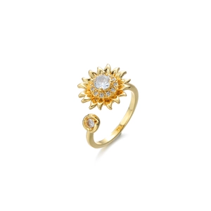 Adjustable golden sunflower ring with sparkling cubic zirconia flower center petals