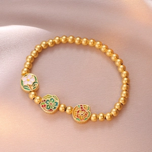 Bracciale vintage in perline d'oro opaco con tre ciondoli colorati in smalto a loto