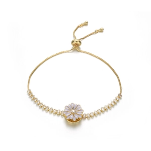 Close-up of a golden daisy bracelet with purple petals and sparkling adjustable zircon chain