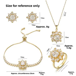 Conjunto de joyas de flores doradas con collar, pendientes y anillo de circonitas brillantes